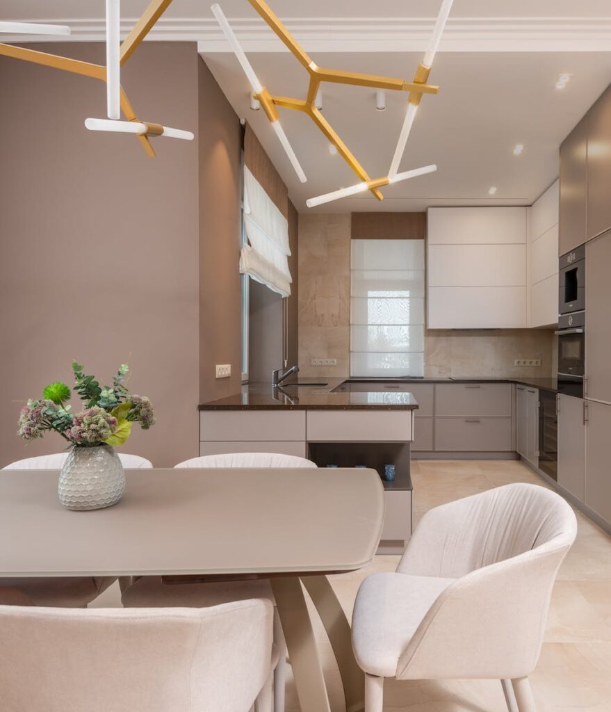 Stylish kitchen and dining area, monochromatic neutrals interior design 